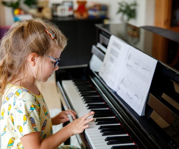 Little,School,Girl,Learning,To,Play,On,Piano.,Cute,Exciting