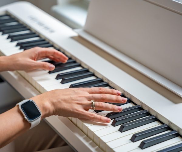 Closeup,Woman's,Hand,Playing,Piano.,Concept,Of,Home,Lesson,Of